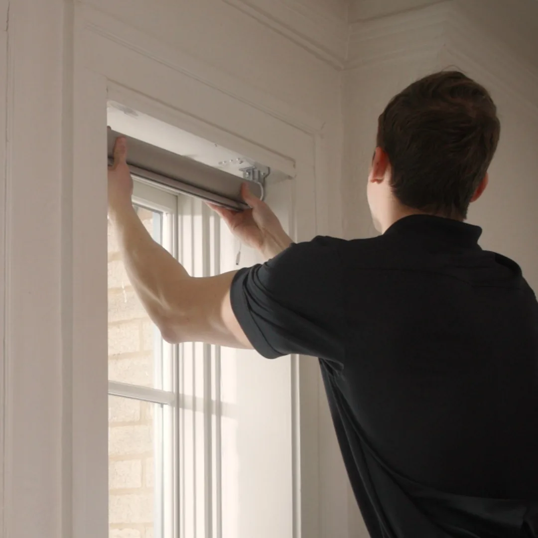 West Shade Co installer mounting a shade in South Jordan